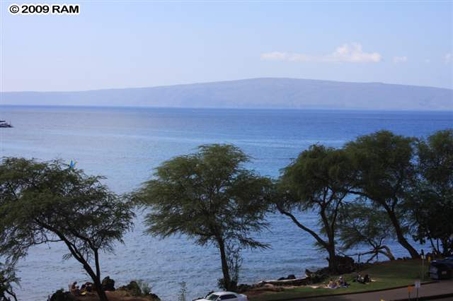5077 Makena Road, Unit PAPA'ANUI LOT 7 Kihei, HI 96753 - Photo 18 of 22 a view of a yard and mountain in the back