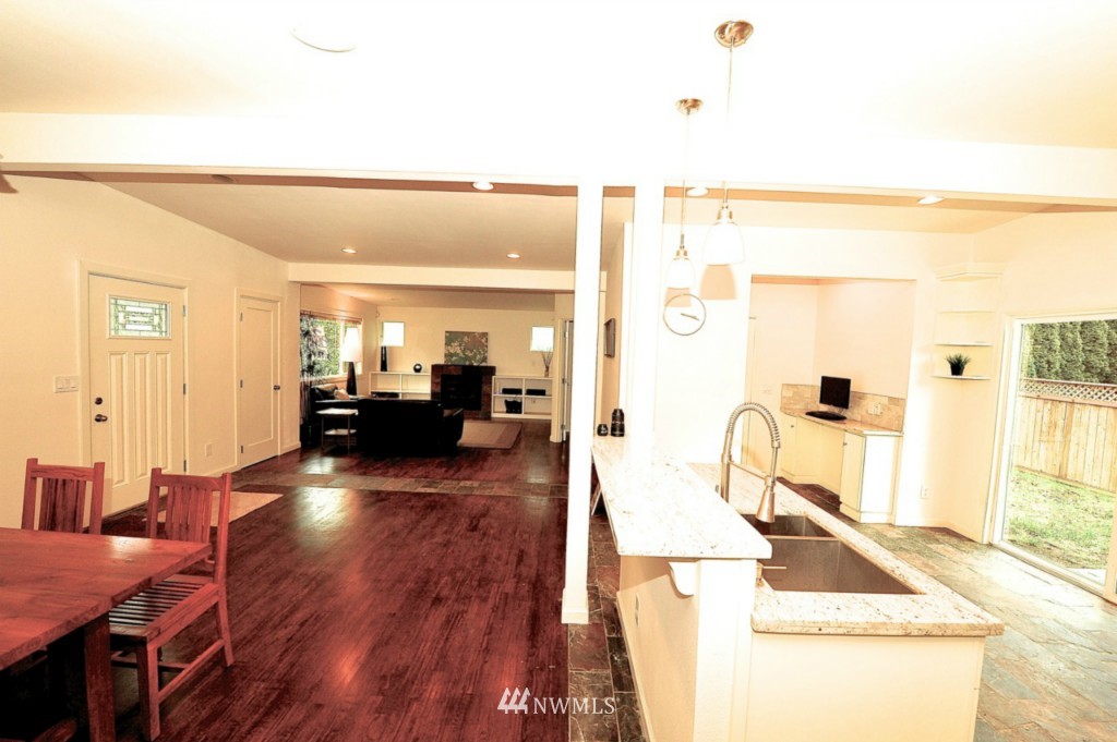 14205 Southeast Allen Rd. Bellevue, WA 98006 - Photo 5 of 15 a view of a living room and dining room