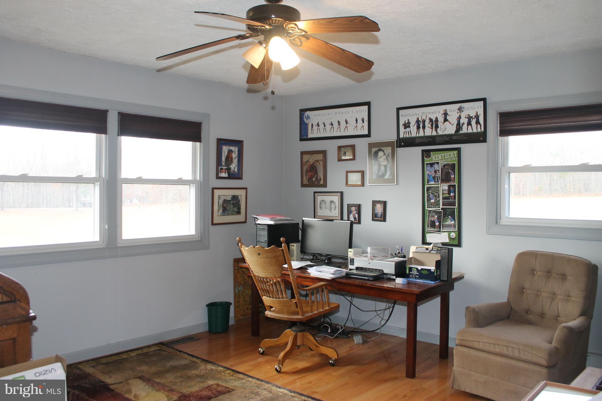 64 Castle Mountain Road Castleton, VA 22716 - Photo 22 of 29 Bedroom, Bedroom, wood floor and ceiling fan