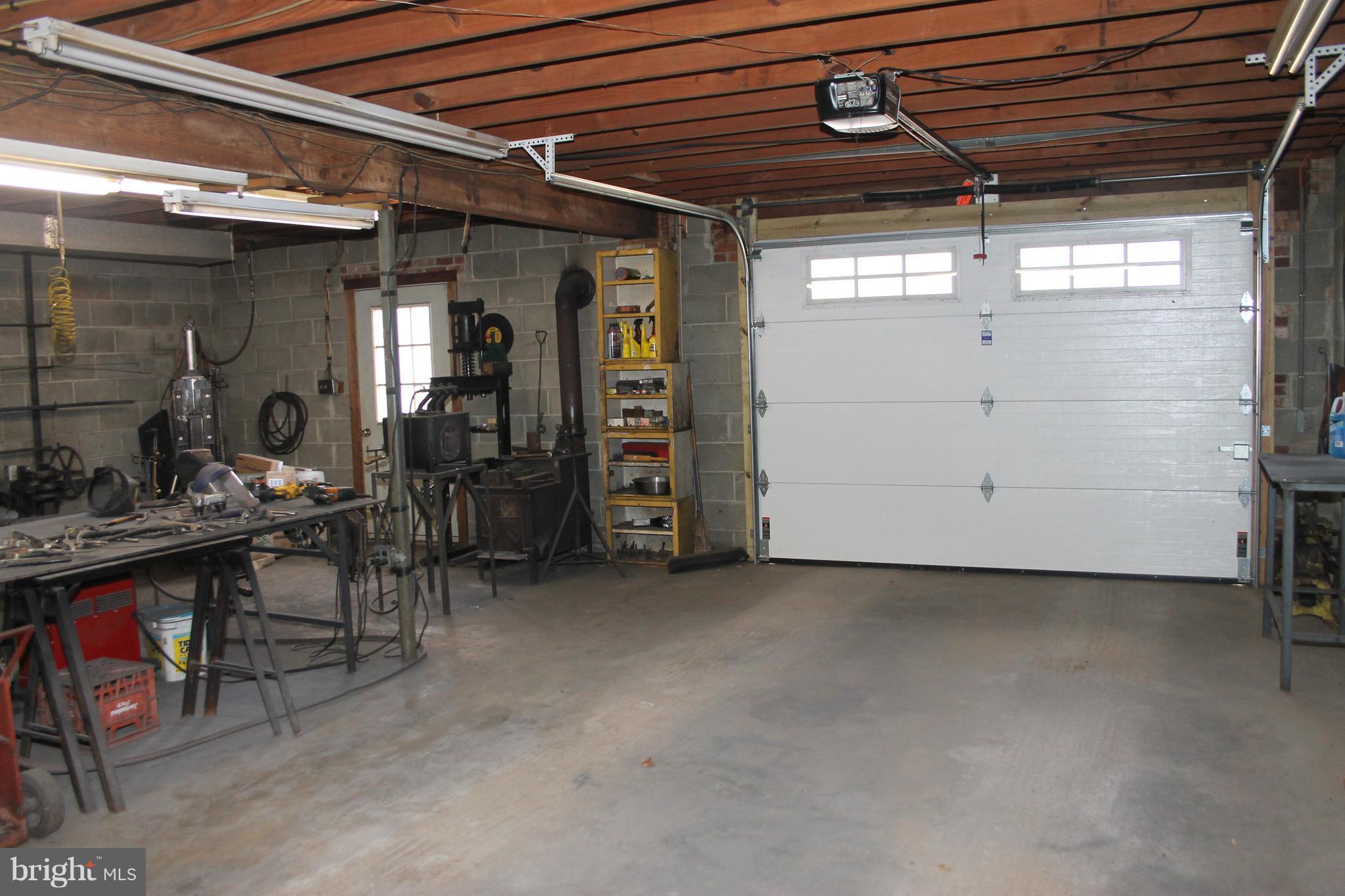 64 Castle Mountain Road Castleton, VA 22716 - Photo 25 of 29 Garage with overhead door with opener