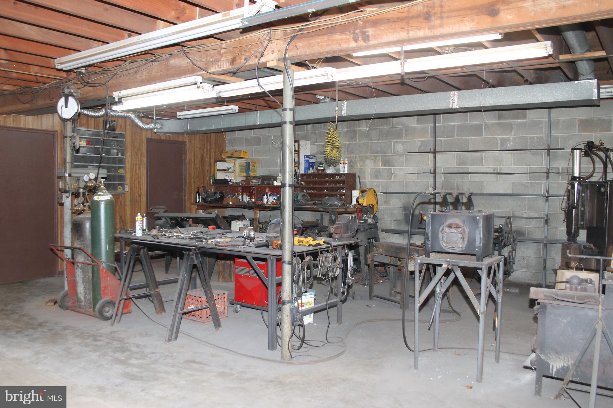 64 Castle Mountain Road Castleton, VA 22716 - Photo 26 of 29 Workshop area in garage