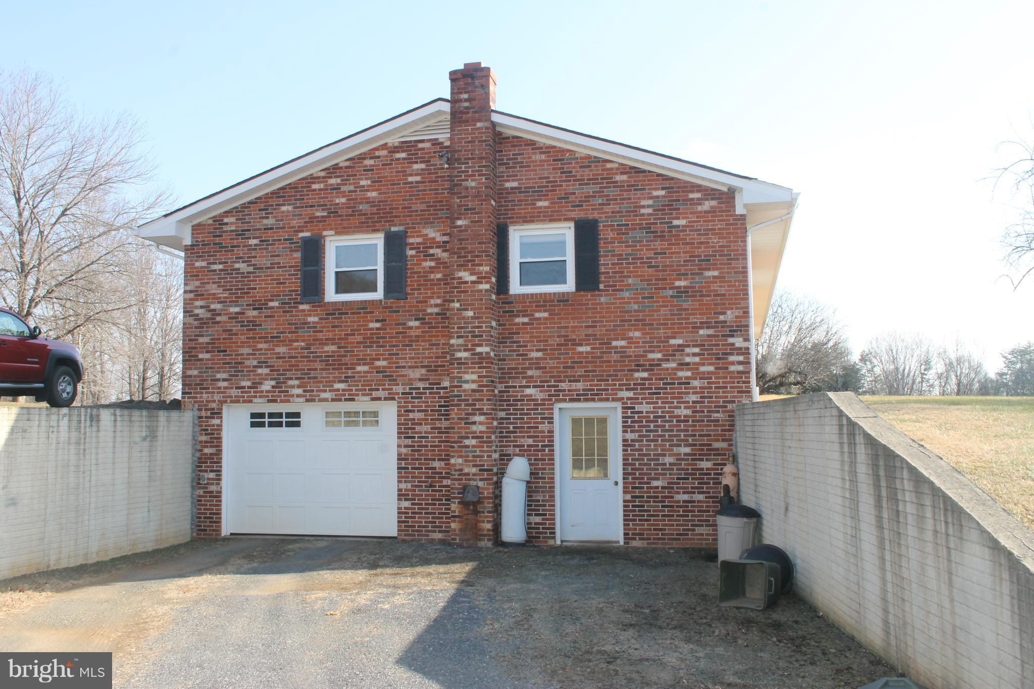 64 Castle Mountain Road Castleton, VA 22716 - Photo 7 of 29 Lower level entry to garage and workshop