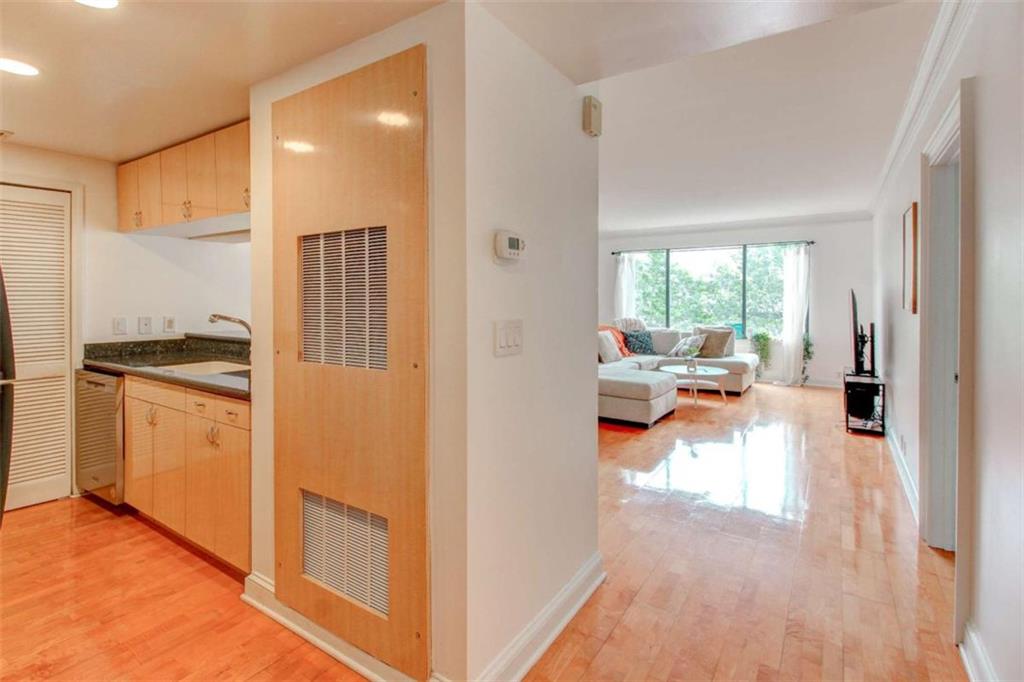 3481 Lakeside Drive Northeast, Unit 902 Atlanta, GA 30326 - Photo 2 of 43 a living room with furniture and a large window