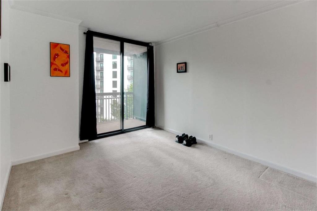 3481 Lakeside Drive Northeast, Unit 902 Atlanta, GA 30326 - Photo 22 of 43 a view of an empty room with a window