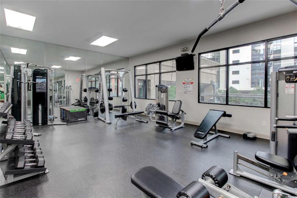 3481 Lakeside Drive Northeast, Unit 902 Atlanta, GA 30326 - Photo 32 of 43 a view of a room with gym equipment