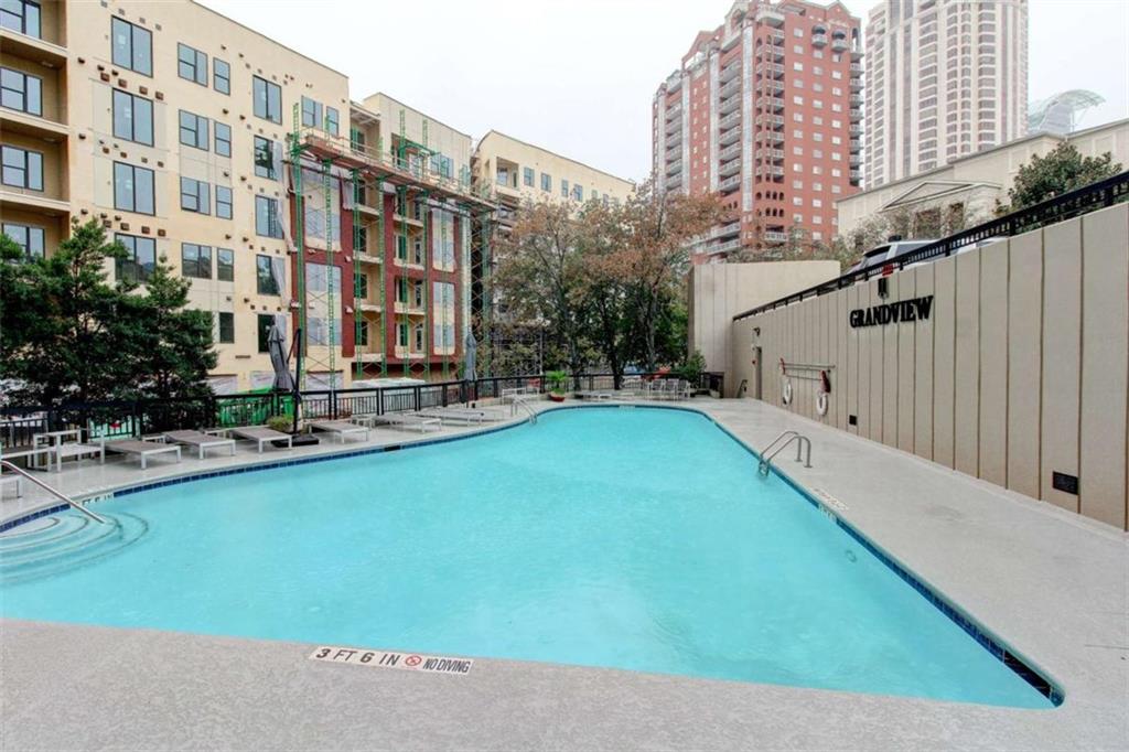 3481 Lakeside Drive Northeast, Unit 902 Atlanta, GA 30326 - Photo 34 of 43 a view of buildings with swimming pool
