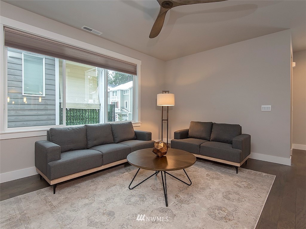 17 197th Place Southwest Bothell, WA 98012 - Photo 13 of 34 a living room with furniture and a large window