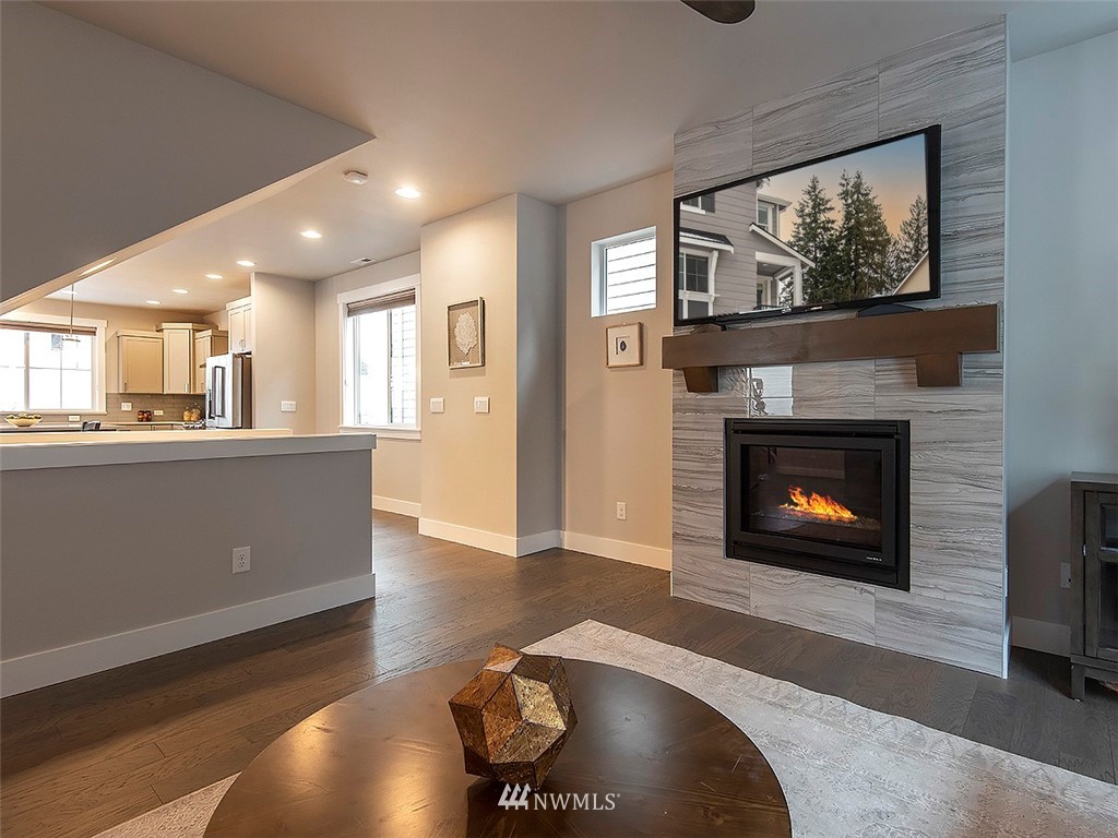 17 197th Place Southwest Bothell, WA 98012 - Photo 15 of 34 a view of a living room and a fireplace