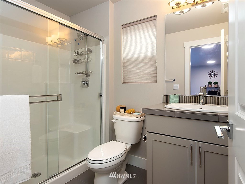 17 197th Place Southwest Bothell, WA 98012 - Photo 20 of 34 a bathroom with a sink toilet and shower