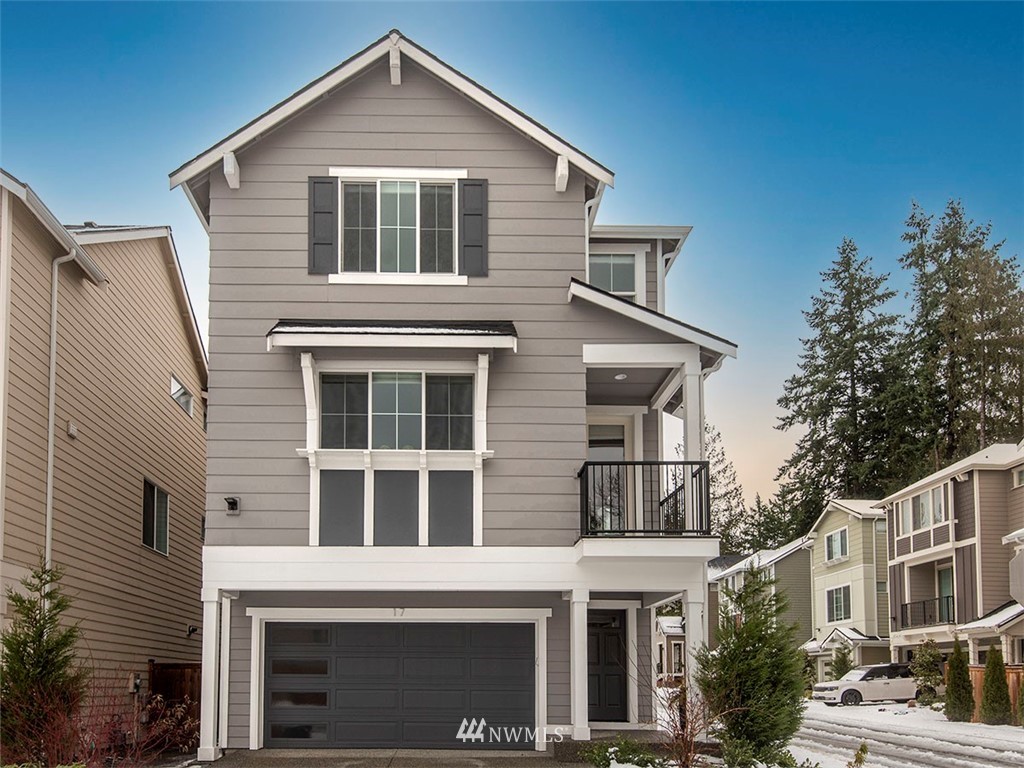 17 197th Place Southwest Bothell, WA 98012 - Photo 2 of 34 a front view of a house with a yard