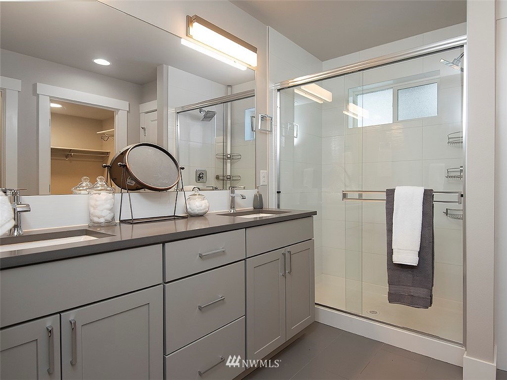 17 197th Place Southwest Bothell, WA 98012 - Photo 23 of 34 a bathroom with a double vanity sink and mirror