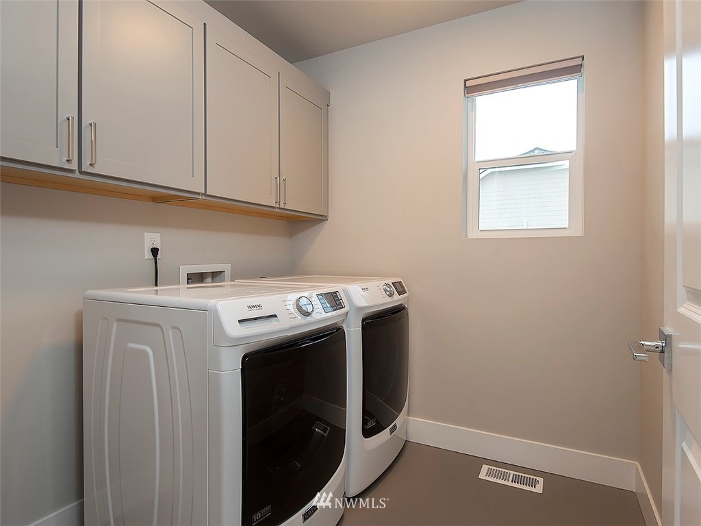 17 197th Place Southwest Bothell, WA 98012 - Photo 27 of 34 a utility room with dryer and washer