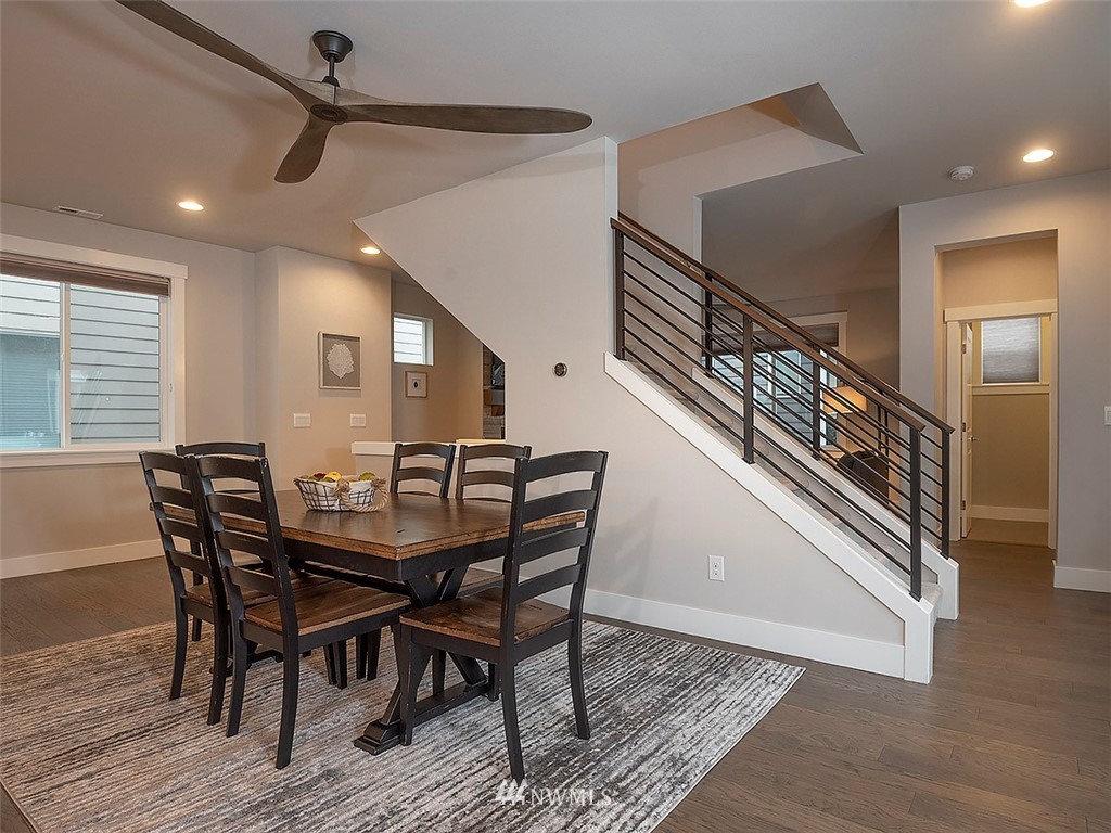 17 197th Place Southwest Bothell, WA 98012 - Photo 10 of 34 a view of a dining room with furniture and wooden floor