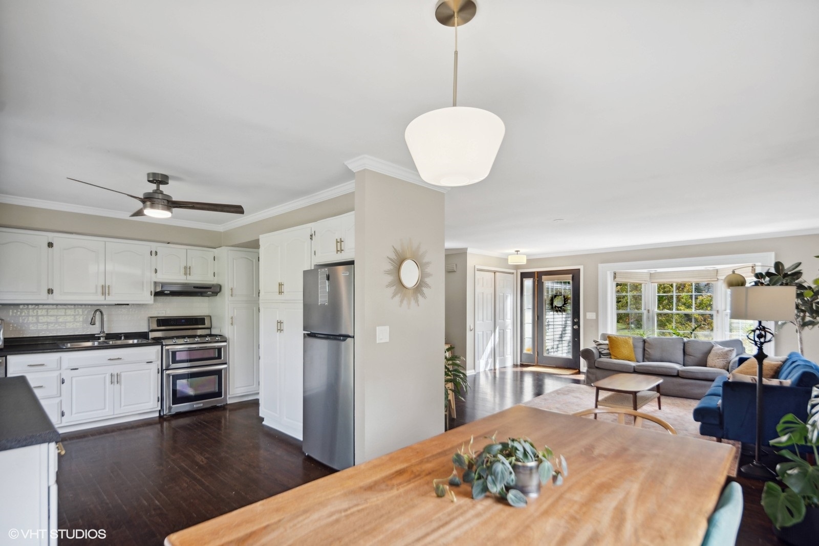 120 North Lambert Road Glen Ellyn, IL 60137 - Photo 12 of 30 a kitchen with kitchen island granite countertop a sink cabinets and stainless steel appliances