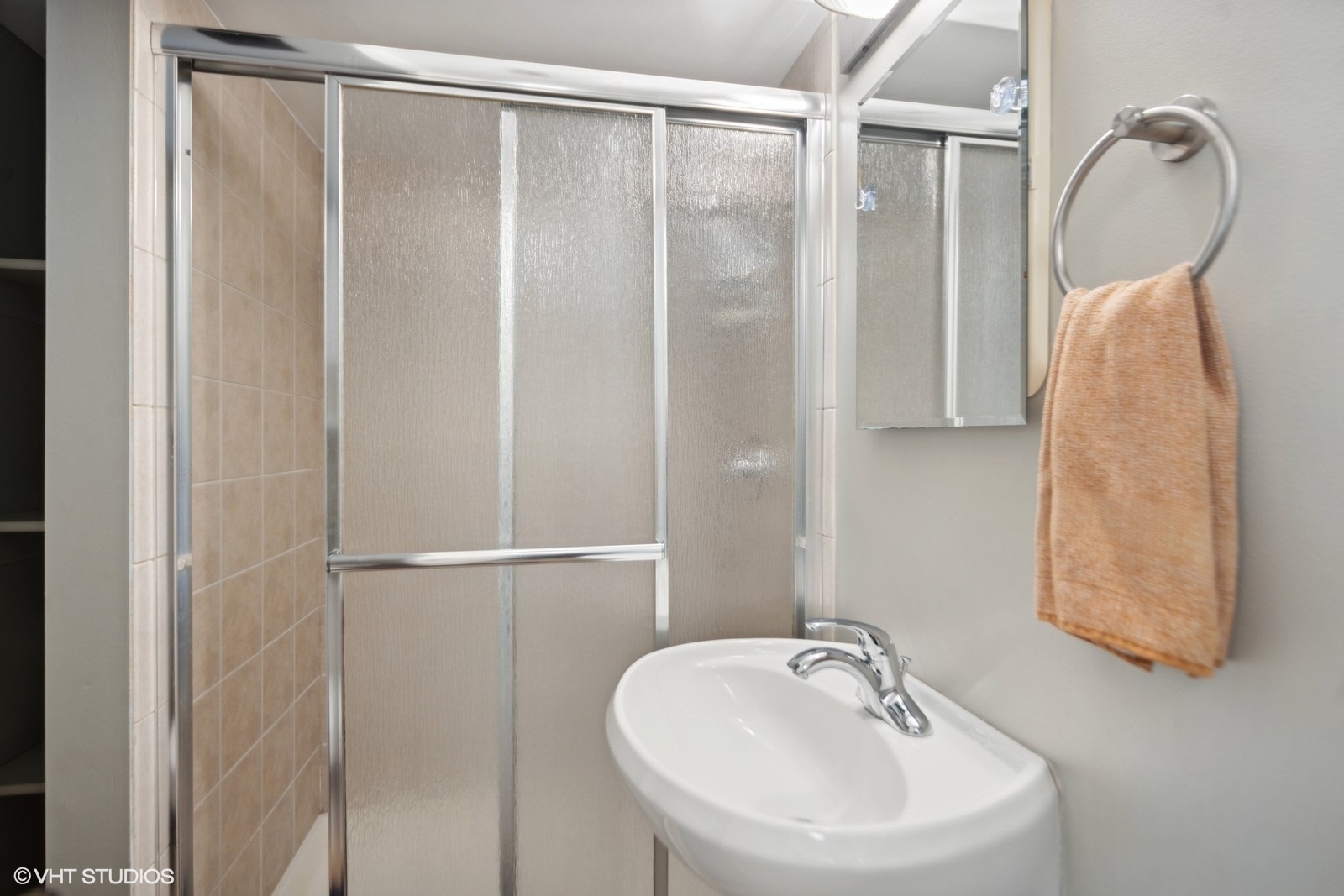 120 North Lambert Road Glen Ellyn, IL 60137 - Photo 20 of 30 a bathroom with a sink and a mirror