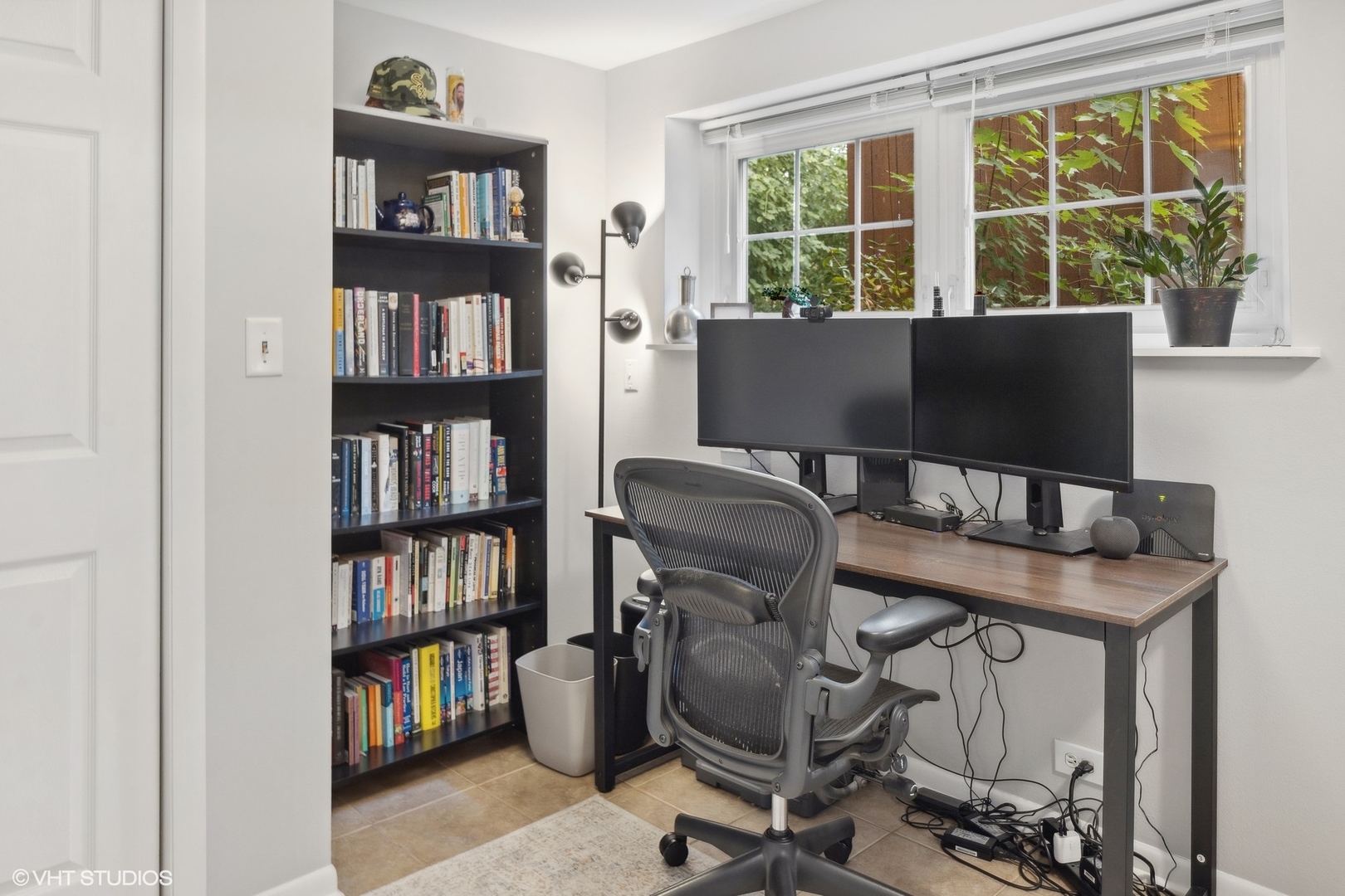 120 North Lambert Road Glen Ellyn, IL 60137 - Photo 23 of 30 a view of a workspace with a bookshelf
