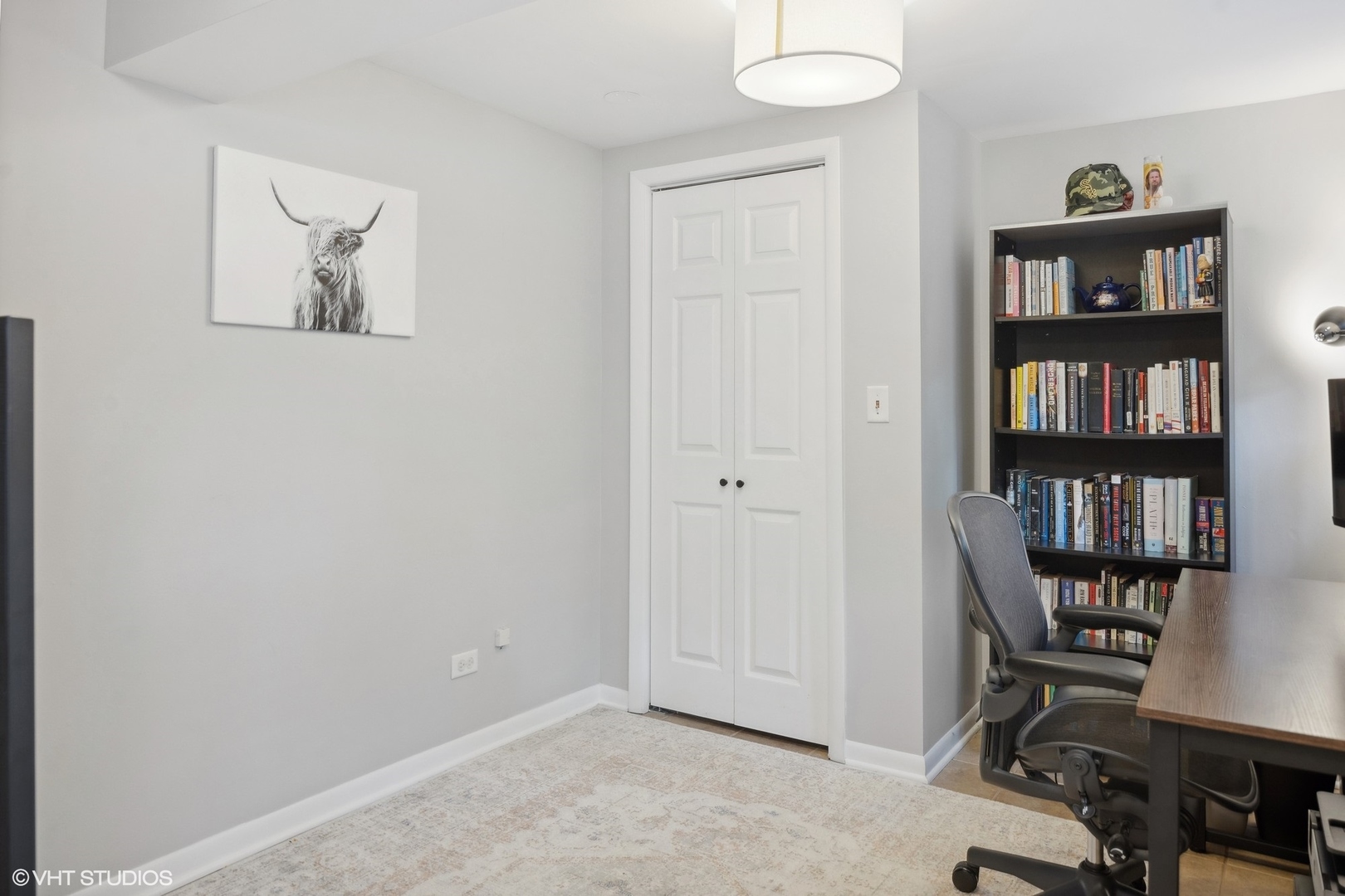 120 North Lambert Road Glen Ellyn, IL 60137 - Photo 24 of 30 a view of a workspace with a bookshelf