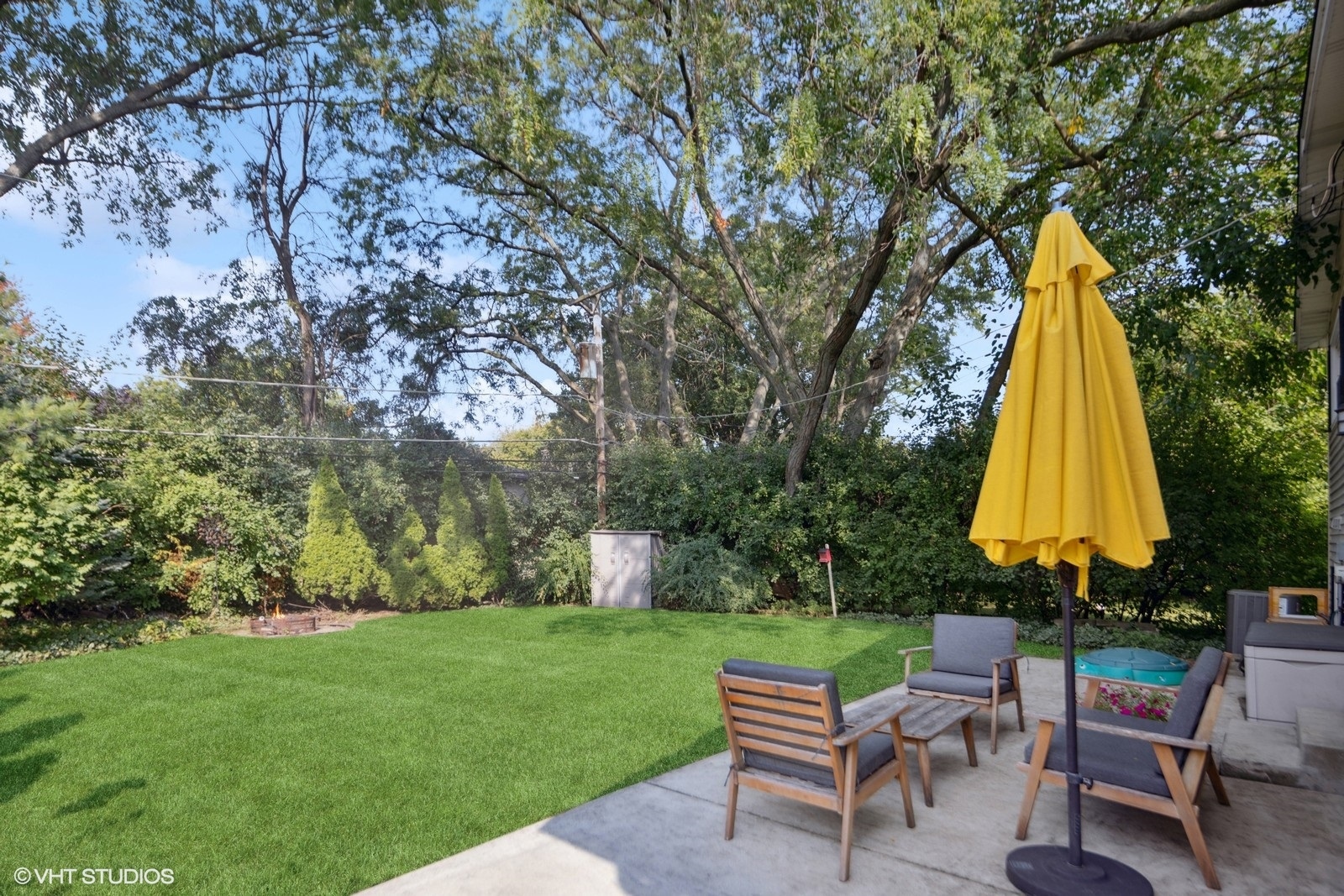 120 North Lambert Road Glen Ellyn, IL 60137 - Photo 25 of 30 a view of a chair and table in the garden