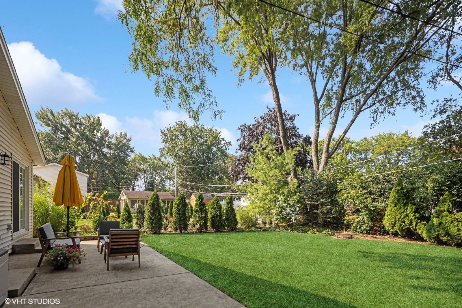 120 North Lambert Road Glen Ellyn, IL 60137 - Photo 26 of 30 a view of a bench in a garden