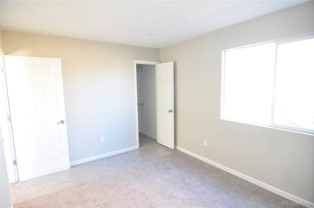 an empty room with a window