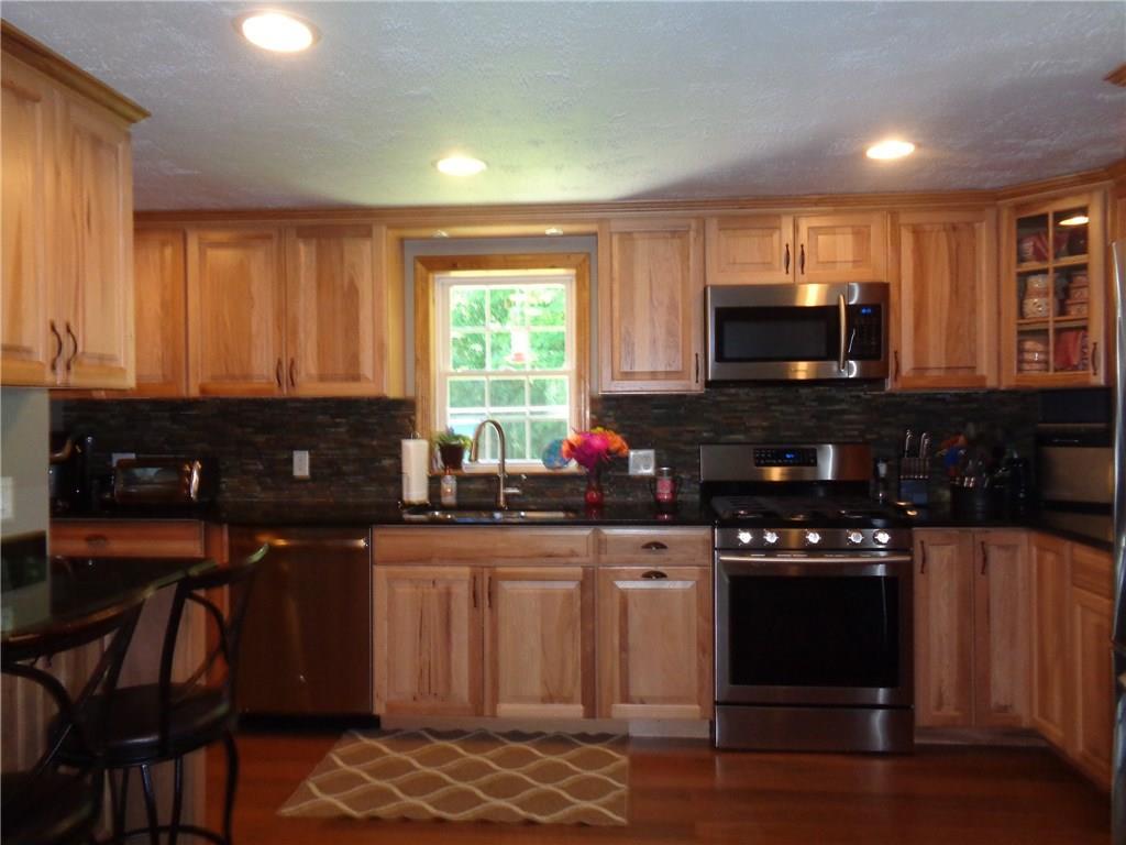 661 Tate Road Corinth, ME 04427 - Photo 3 of 24 Stainless appliances and granite...