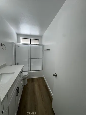 a bathroom with a sink and a shower