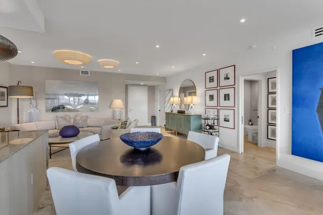 a view of living room with wooden floor