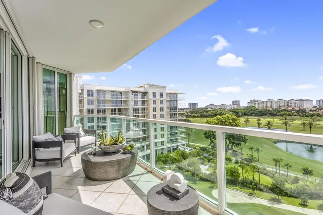 a view of a room that has a large window