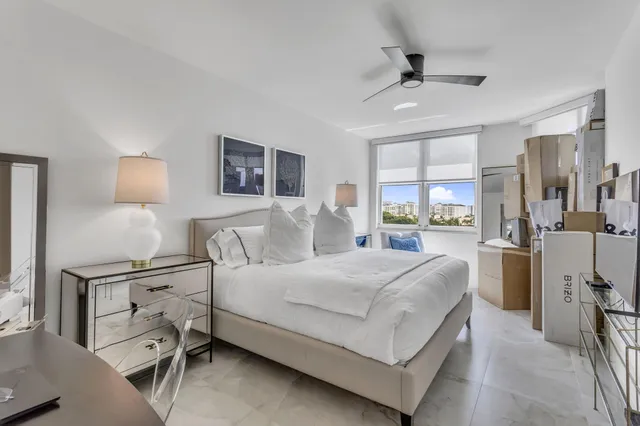 a view of a glass door with a yard from a window