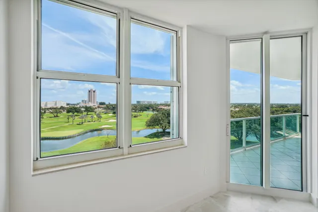 a en suite bathroom with a glass shower door