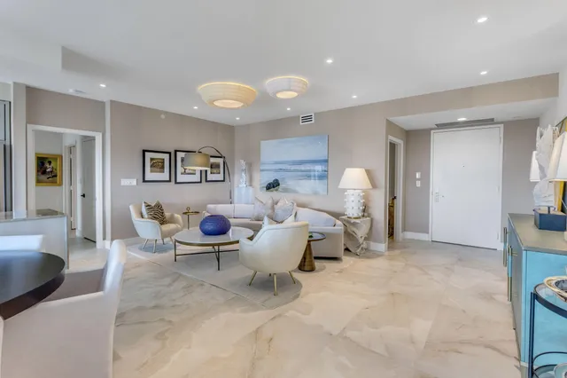 a living room with furniture and a table