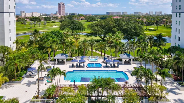 a living room with fireplace furniture and a table