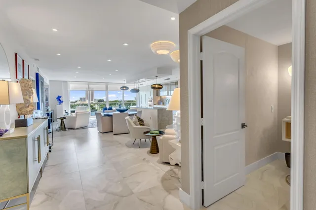 a view of a living room kitchen and a window