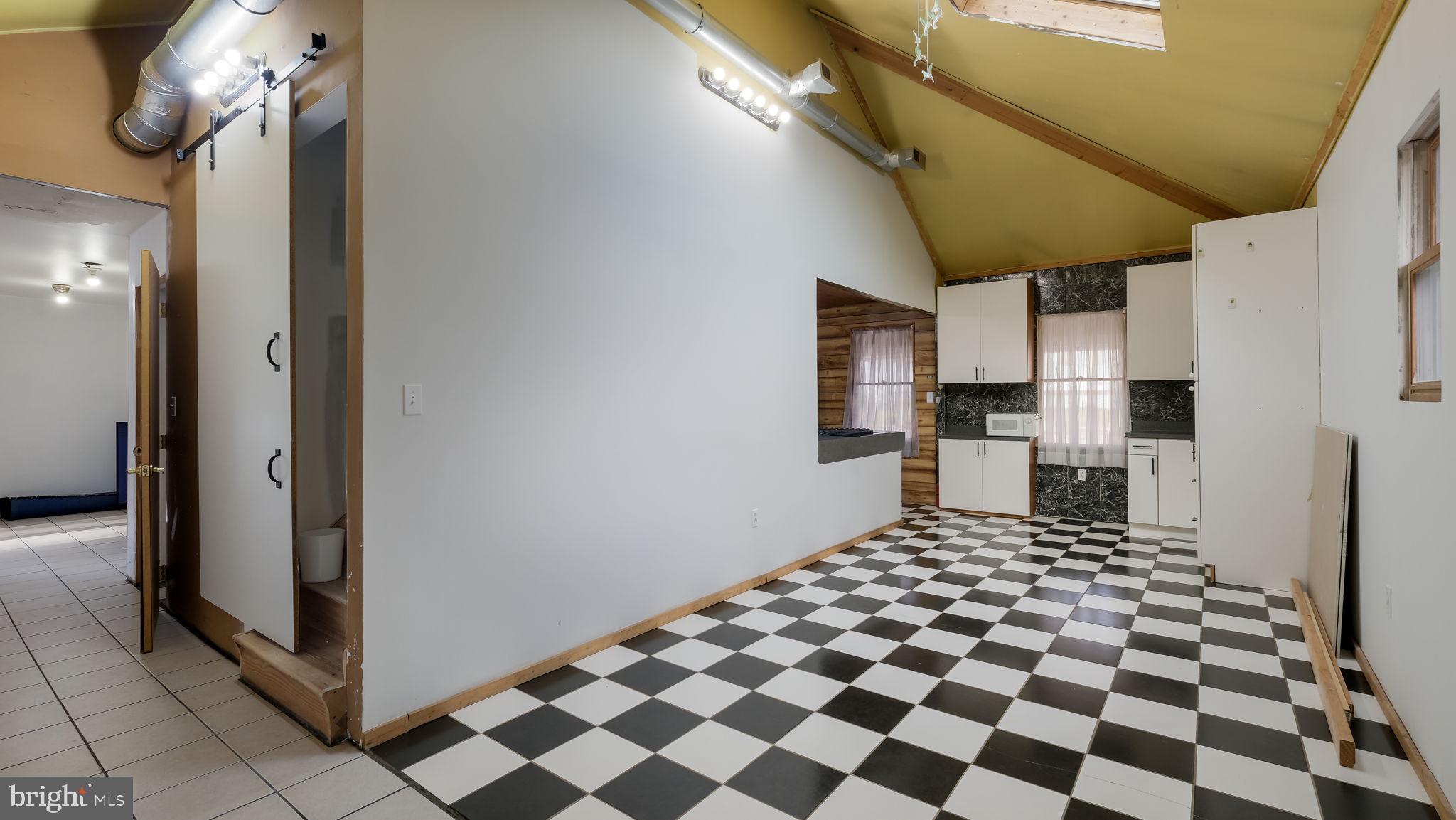 2943 East Walnut Street Colmar, PA 18915 - Photo 11 of 27 a kitchen with stainless steel appliances granite countertop a refrigerator and a stove top oven