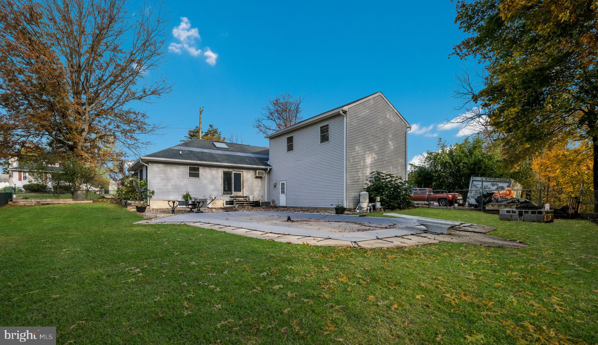 2943 East Walnut Street Colmar, PA 18915 - Photo 25 of 27 a view of a house with a yard and sitting area