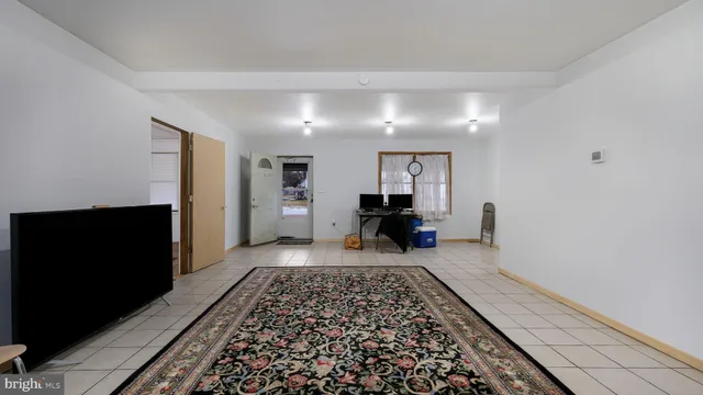 a bed room with a bed and a window