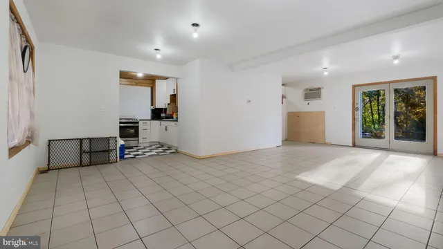 a view of a livingroom with a lounge chair