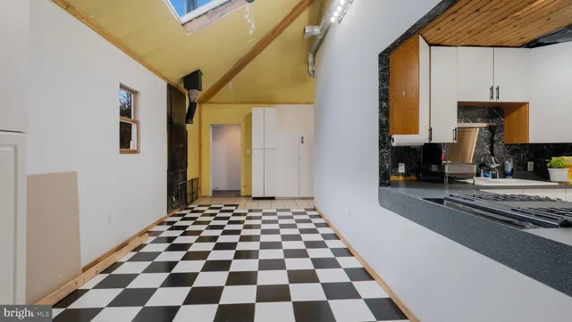 a black and white checkered floor with a black white checkered floor