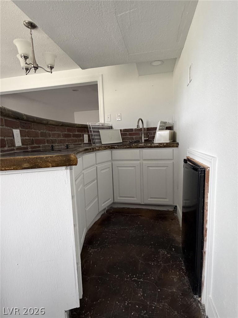 1 Carson Court Ely, NV 89301 - Photo 16 of 20 Down stairs-This versatile space features practical laundry amenities and ample natural light.