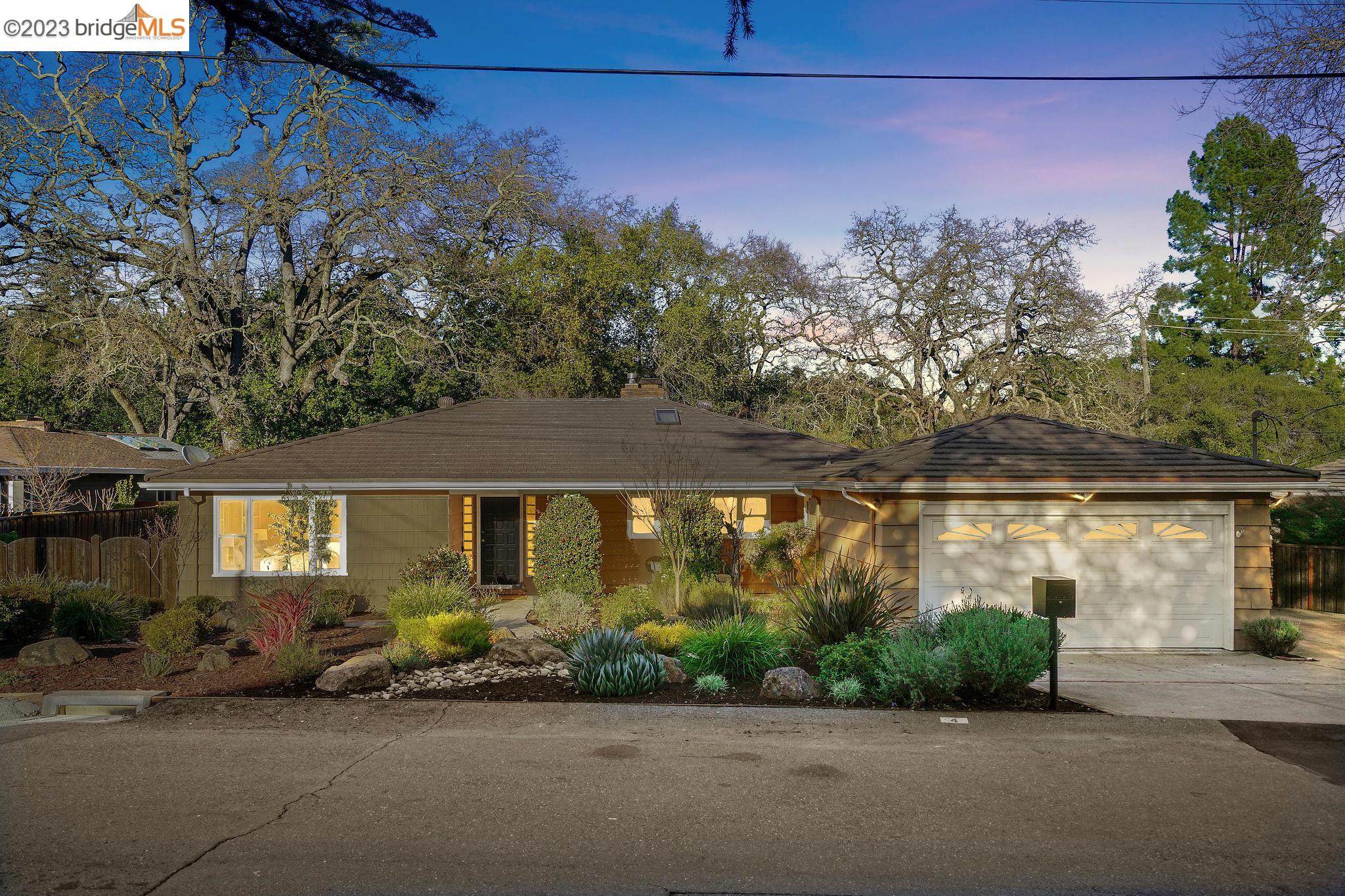 4 Crest Road Lafayette, CA 94549 - Photo 1 of 1 a front view of a house with garden