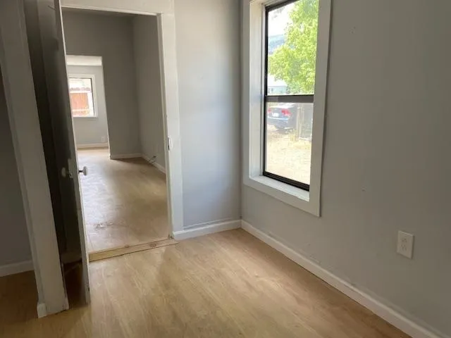 an empty room with windows