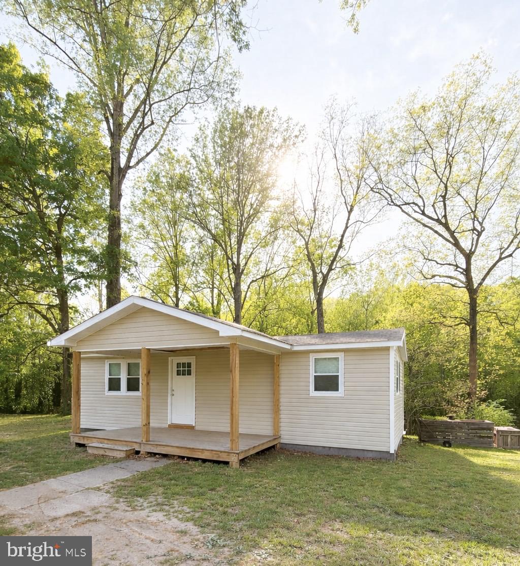 7310 Macedonia Road Woodford, VA 22580 - Photo 17 of 19 Image virtually rendered to show finished porch.