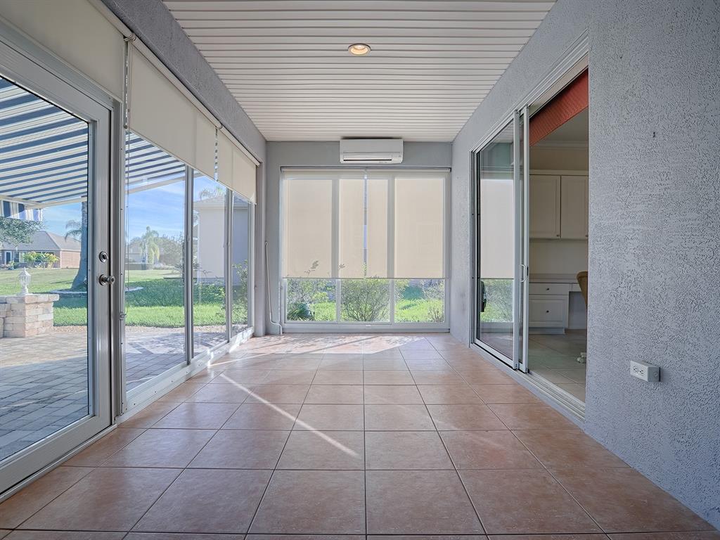 13007 Southeast 90th Court Road Summerfield, FL 34491 - Photo 38 of 78 Enclosed Lanai