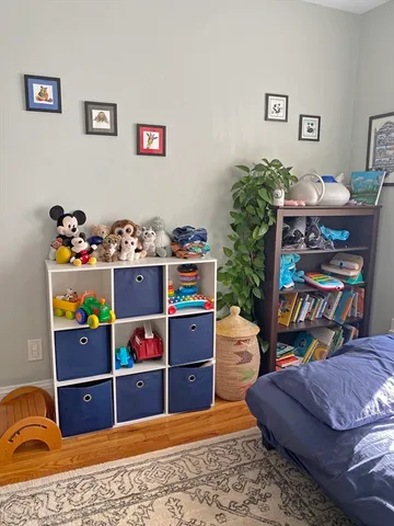 a bed room with a bed and a couch