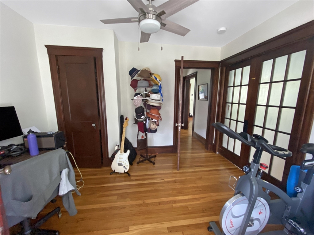 159 Forest Hills Street, Unit 2 Boston, MA 02130 - Photo 17 of 24 a view of a livingroom with furniture and a window