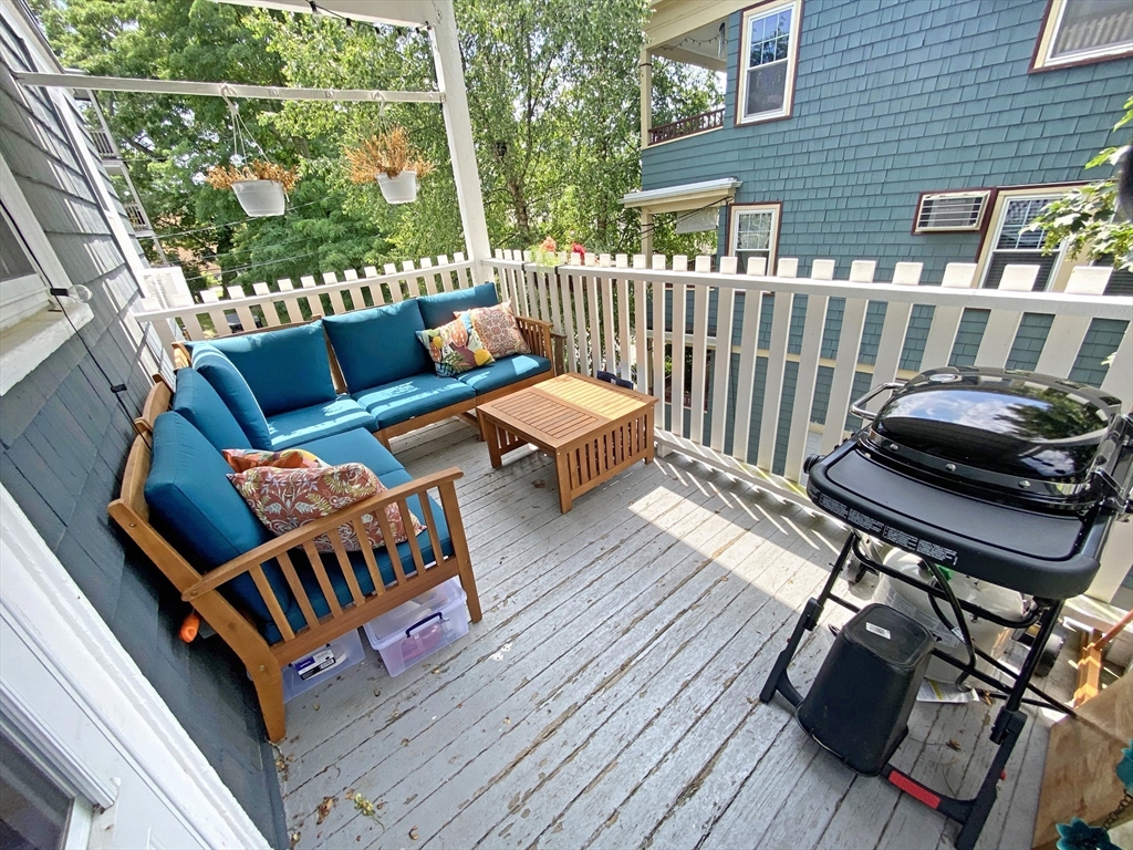 159 Forest Hills Street, Unit 2 Boston, MA 02130 - Photo 18 of 24 a view of a chairs in a deck