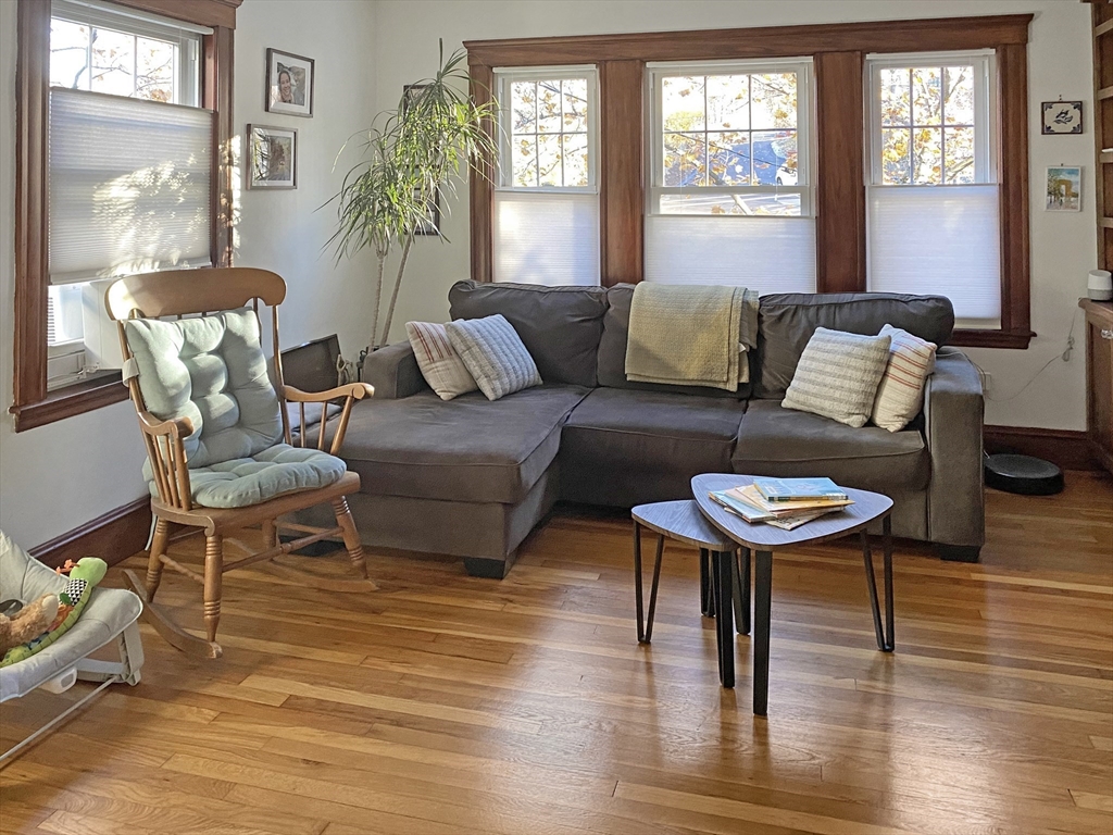 159 Forest Hills Street, Unit 2 Boston, MA 02130 - Photo 2 of 24 a living room with furniture and a large window