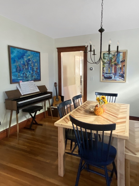 159 Forest Hills Street, Unit 2 Boston, MA 02130 - Photo 6 of 24 a view of a dining room with furniture window and wooden floor