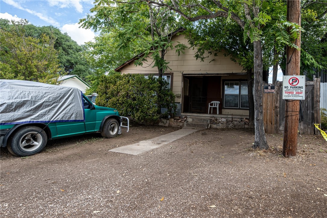 104 North Ave G Johnson City, TX 78636 - Photo 1 of 8 a car parked in front of a house