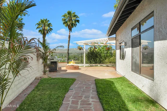 a house view with a garden space